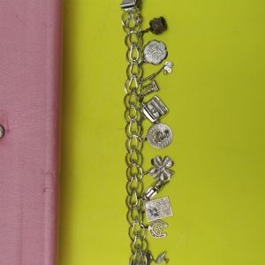 STERLING SILVER CHARM BRACELET WITH 12 CHARMS